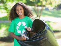 girl with a recycling bag