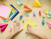 hands making origami