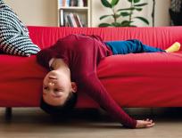 boy lying on the sofa