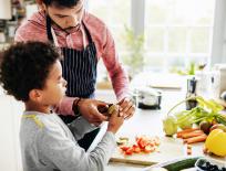 father and son cooking