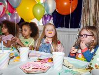 children eating at a birthday party