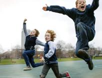 Children jumping high in the air