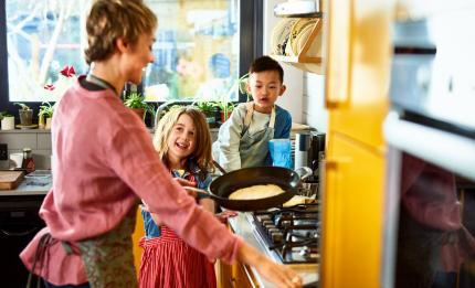 family making pancakes