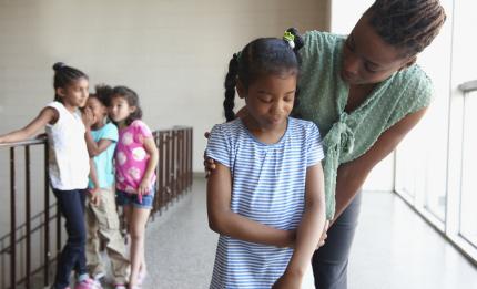 bullied girl with teacher