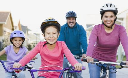 family riding bikes