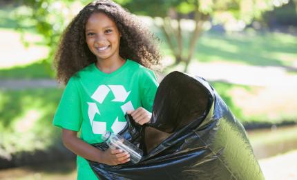 girl with a recycling bag