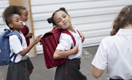 girls wearing school uniform