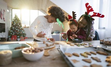 a family making Christmas biscuits