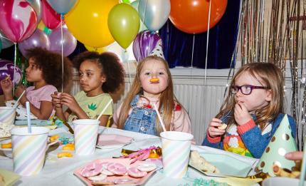 children eating at a birthday party