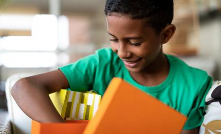 boy opening a present