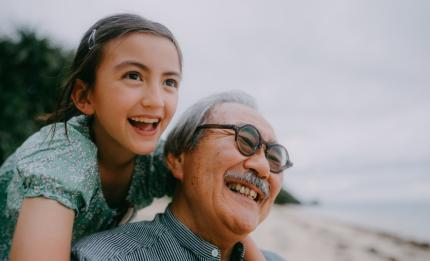 happy grandfather and granddaughter