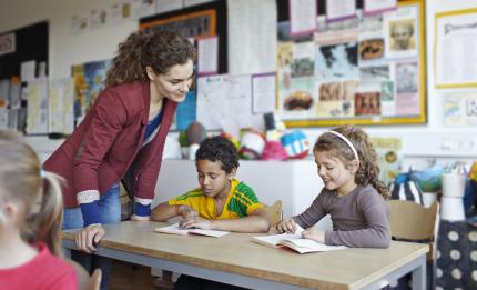 teacher and two schoolchildren