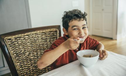 Boy eating a bowl of cereal