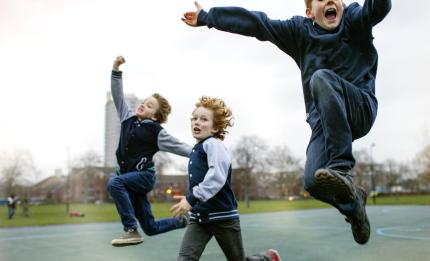 Children jumping high in the air