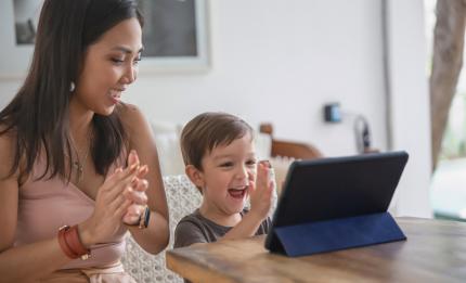 woman and boy clapping 