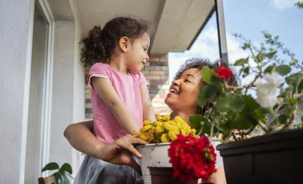 mother and daughter on balcony