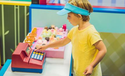 boy playing shop