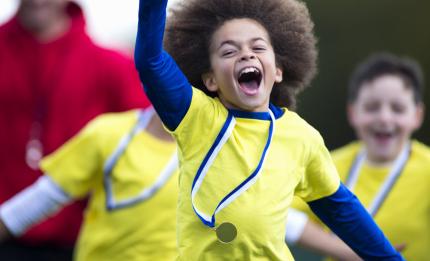 boy winning a race