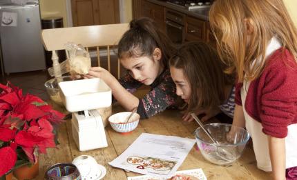 girls weighing ingredients