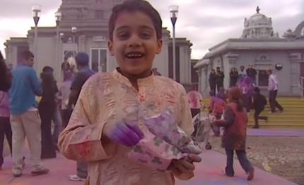 boy celebrating Holi