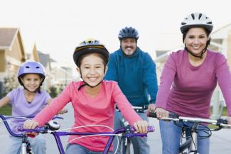 family riding bikes