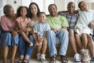 large family sitting on a sofa