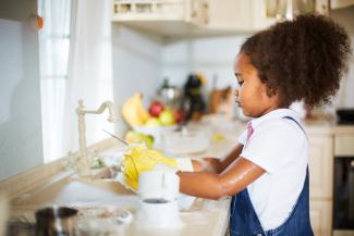 girl doing washing up