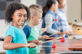 children playing musical intruments