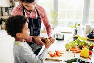 father and son cooking