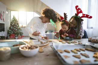 a family making Christmas biscuits