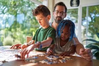 family doing a jigsaw