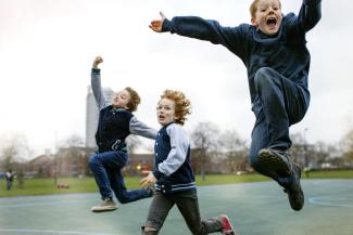 Children jumping high in the air