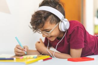 boy listening with headphones