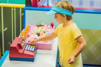 boy playing shop