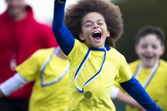 boy winning a race