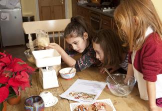 girls weighing ingredients