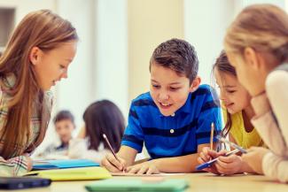 children doing group work in class